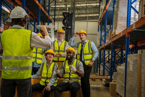 cheerful-logistics-workers-in-a-large-distribution-2025-01-09-12-54-48-utc