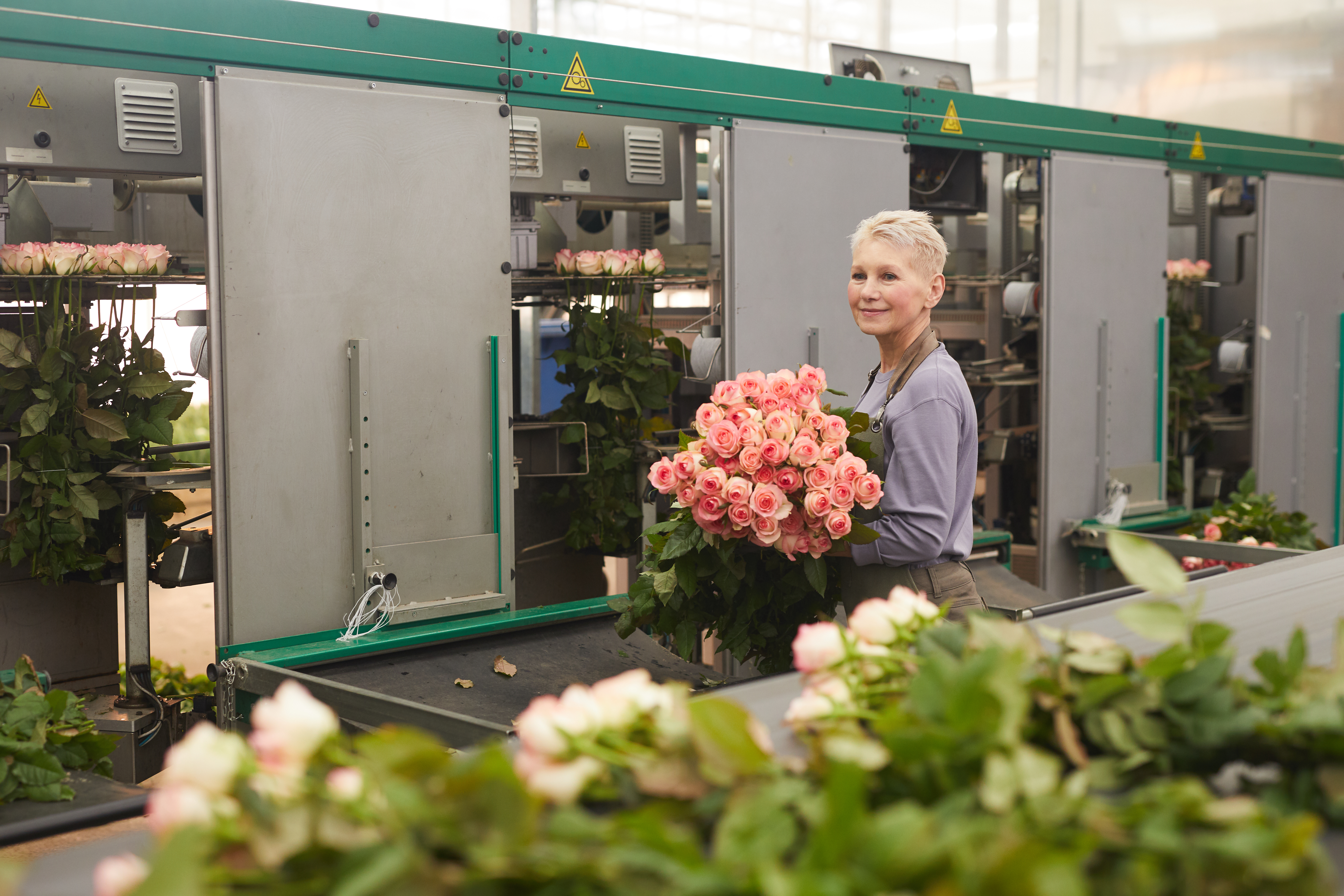 gardener-working-in-greenhouse-2025-02-12-01-57-43-utc